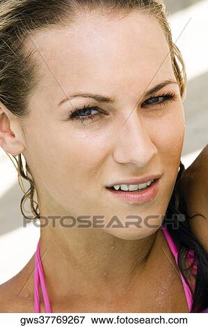Portrait of a young woman View Large Photo Image Stock Photo - Portrait of a young woman. Fotosearch