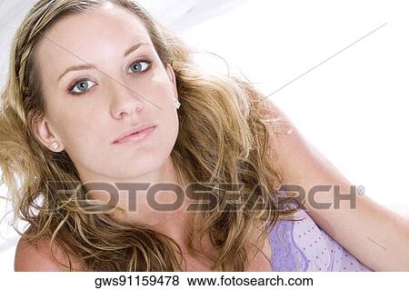 Portrait of a young woman View Large Photo Image Stock Photo - Portrait of a young woman. Fotosearch