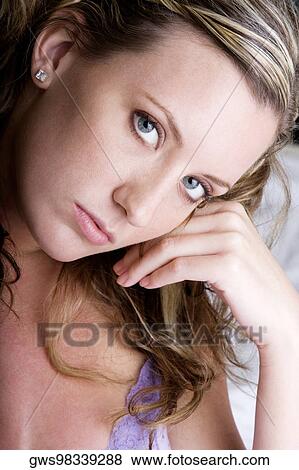 Portrait of a young woman View Large Photo Image Stock Photo - Portrait of a young woman. Fotosearch