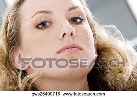 Portrait of a young woman View Large Photo Image Stock Photography - Portrait of a young woman. Fotosearch