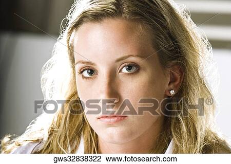 Portrait of a young woman thinking View Large Photo Image Stock Image - Portrait of a young woman thinking. Fotosearch