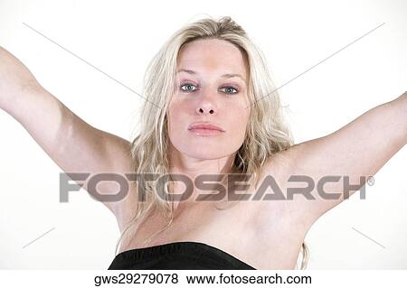 Portrait of a young woman with her arms outstretched View Large Photo Image Stock Photo - Portrait of a young woman with her arms outstretched. Fotosearch