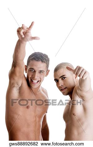 Portrait of two young men gesturing View Large Photo Image Stock Image - Portrait of two young men gesturing. Fotosearch