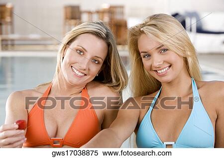 Portrait of two young women smiling View Large Photo Image Stock Photography - Portrait of two young women smiling. Fotosearch