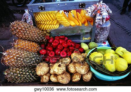 Sidewalk fruit stand, Ho Chi Minh City (formerly Saigon) Vietnam View Large Photo Image Stock Photograph - Sidewalk fruit stand, Ho Chi Minh City (formerly Saigon) Vietnam. Fotosearch