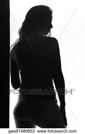 Silhouette of a young woman View Large Photo Image Stock Image - Silhouette of a young woman. Fotosearch