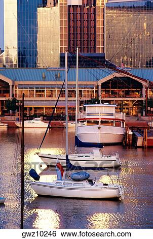 Sunrise of boats in Baltimore inner harbor near harbor place, Maryland View Large Photo Image Stock Photograph - Sunrise of boats in Baltimore inner harbor near harbor place, Maryland. Fotosearch