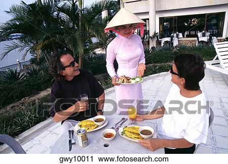 Three people dining at Century Riverside Hotel, Hue, Vietnam View Large Photo Image Stock Image - Three people dining at Century Riverside Hotel, Hue, Vietnam. Fotosearch