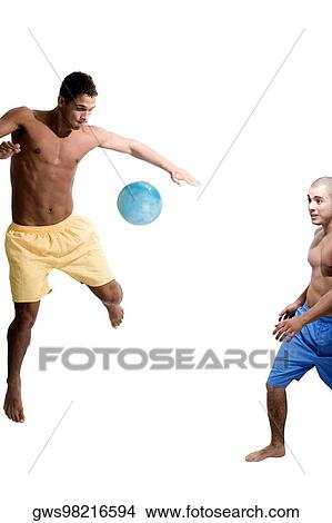 Picture - Two young men playing with a ball. Fotosearch