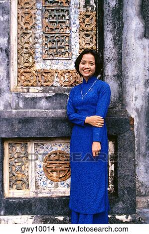 Woman in Ao Dai at Forbidden City, Hue, Vietnam View Large Photo Image Picture - Woman in Ao Dai at Forbidden City, Hue, Vietnam. Fotosearch