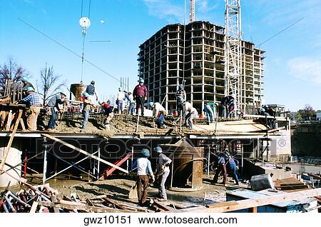 Workers pouring cement in new office building in Bethesda, Maryland View Large Photo Image Stock Image - Workers pouring cement in new office building in Bethesda, Maryland. Fotosearch