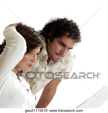 Young couple reading documents View Large Photo Image Stock Photo - Young couple reading documents. Fotosearch