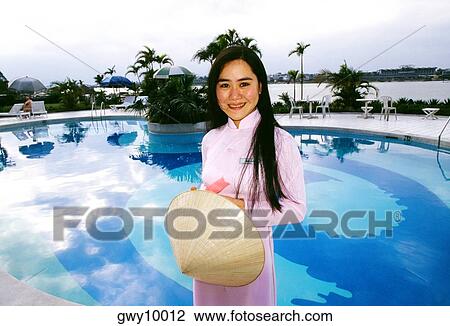 Young woman in Hue, Vietnam View Large Photo Image Stock Image - Young woman in Hue, Vietnam. Fotosearch