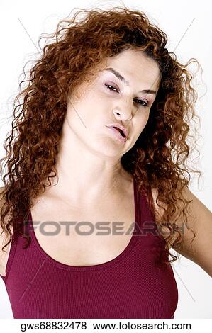 Stock Photo - Young woman making a face. Fotosearch