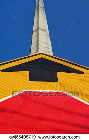 Stock Photo - Arrow sign in front of monument, Washington Monument, Washington DC, USA. Fotosearch