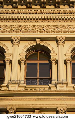 Building with windows and carved panels View Large Photo Image Stock Image - Building with windows and carved panels. Fotosearch