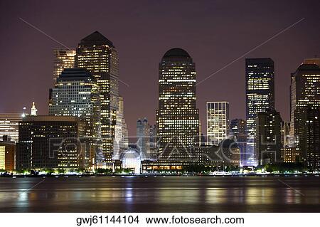 Buildings lit up at night, New York City, New York State, USA View Large Photo Image Picture - Buildings lit up at night, New York City, New York State, USA. Fotosearch