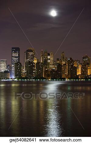 Buildings lit up at night, New York City, New York State, USA View Large Photo Image Stock Image - Buildings lit up at night, New York City, New York State, USA. Fotosearch