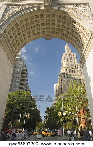 Stock Photo - Buildings seen through an archway. Fotosearch