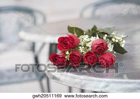 Stock Photo - Close-up of a bunch of roses on a table. Fotosearch