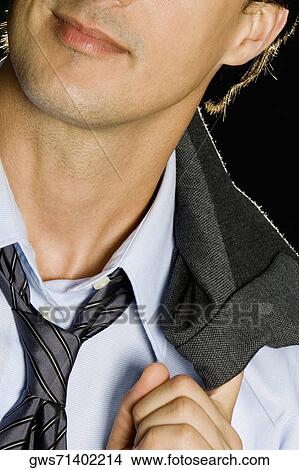 Close-up of a businessman View Large Photo Image Picture - Close-up of a businessman. Fotosearch