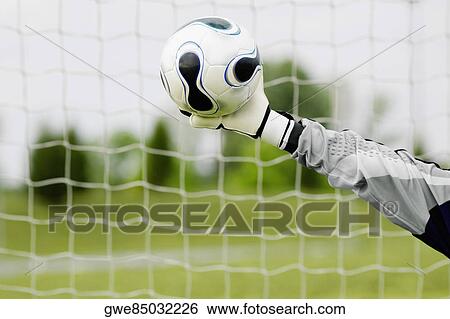 Stock Photograph - Close-up of a goalie's hand making a save. Fotosearch