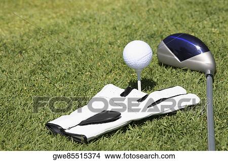 Close-up of a golf club near a golf ball and a golf glove View Large Photo Image Picture - Close-up of a golf club near a golf ball and a golf glove. Fotosearch