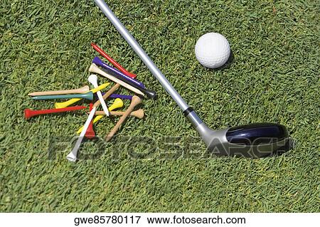 Close-up of a golf club with a golf ball and tees on the grass View Large Photo Image Stock Photo - Close-up of a golf club with a golf ball and tees on the grass. Fotosearch