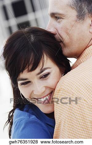 Stock Photo - Close-up of a mature man and a young woman. Fotosearch