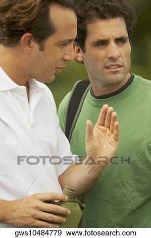 Close-up of a mid adult man and a mature man View Large Photo Image Stock Photo - Close-up of a mid adult man and a mature man. Fotosearch