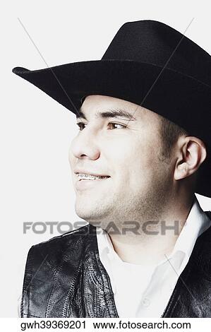 Close-up of a mid adult man posing and smiling View Large Photo Image Stock Image - Close-up of a mid adult man posing and smiling. Fotosearch