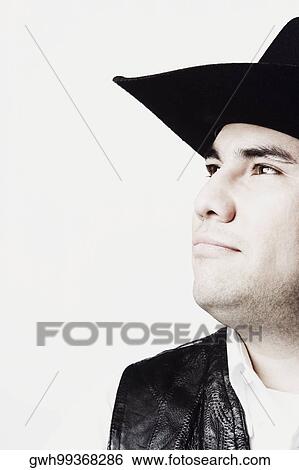 Close-up of a mid adult man posing View Large Photo Image Stock Photograph - Close-up of a mid adult man posing. Fotosearch