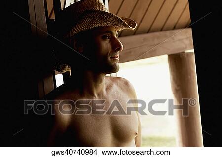 Close-up of a mid adult man thinking View Large Photo Image Picture - Close-up of a mid adult man thinking. Fotosearch
