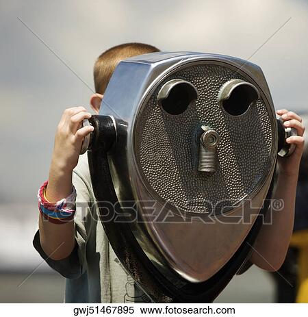 Close-up of a person looking through coin-operated binoculars, New York City, New York State, USA View Large Photo Image Stock Photography - Close-up of a person looking through coin-operated binoculars, New York City, New York State, USA. Fotosearch