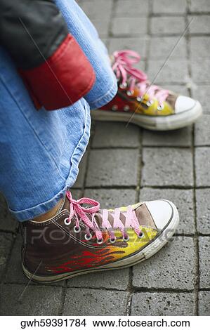 Close-up of a person's leg with shoes View Large Photo Image Picture - Close-up of a person's leg with shoes. Fotosearch