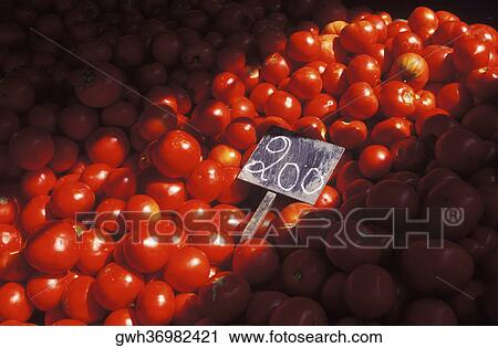 Close-up of a price tag on a heap of tomatoes View Large Photo Image Stock Image - Close-up of a price tag on a heap of tomatoes. Fotosearch