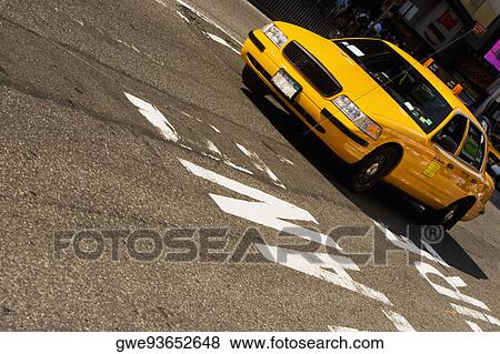 Stock Photo - Close-up of a taxi on the road, New York City, New York State, USA. Fotosearch
