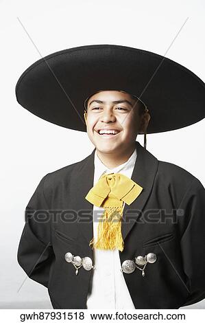 Stock Photo - Close-up of a teenage boy in traditional clothing. Fotosearch