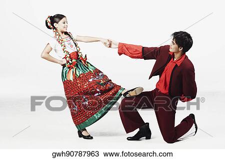 Close-up of a teenage couple looking at each other and holding hands View Large Photo Image Stock Image - Close-up of a teenage couple looking at each other and holding hands. Fotosearch