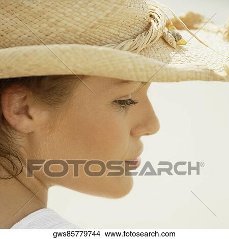 Close-up of a teenage girl looking sideways View Large Photo Image Picture - Close-up of a teenage girl looking sideways. Fotosearch