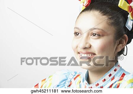 Close-up of a teenage girl smiling View Large Photo Image Stock Image - Close-up of a teenage girl smiling. Fotosearch