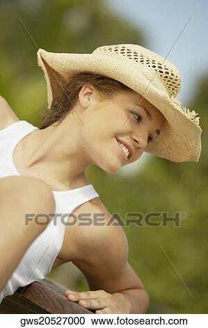 Stock Image - Close-up of a teenage girl smiling. Fotosearch