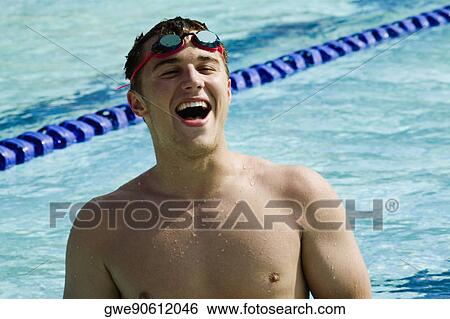 Close-up of a young man laughing View Large Photo Image Stock Photograph - Close-up of a young man laughing. Fotosearch