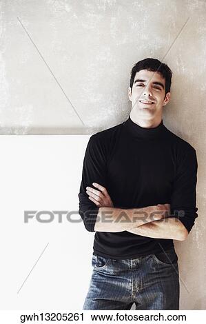 Stock Image - Close-up of a young man smiling. Fotosearch