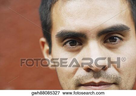 Close-up of a young man View Large Photo Image Stock Photo - Close-up of a young man. Fotosearch