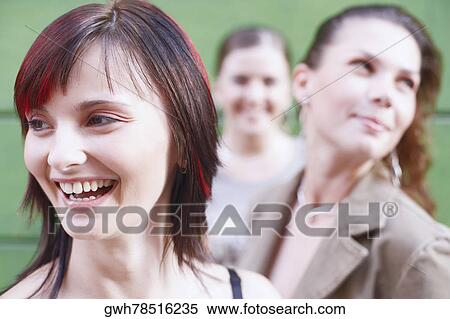 Close-up of a young woman laughing View Large Photo Image Stock Photography - Close-up of a young woman laughing . Fotosearch