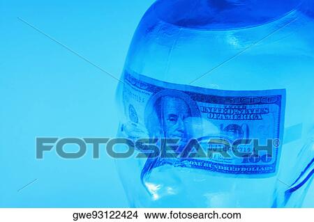 Close-up of an American dollar bill on a glass mannequin View Large Photo Image Picture - Close-up of an American dollar bill on a glass mannequin. Fotosearch