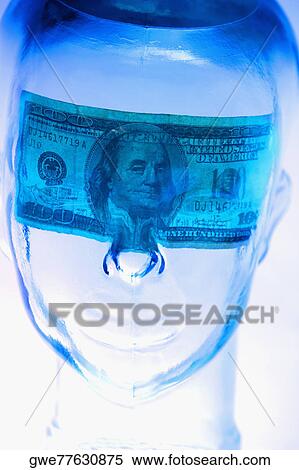Close-up of an American dollar bill on the face of a glass mannequin View Large Photo Image Stock Photography - Close-up of an American dollar bill on the face of a glass mannequin. Fotosearch