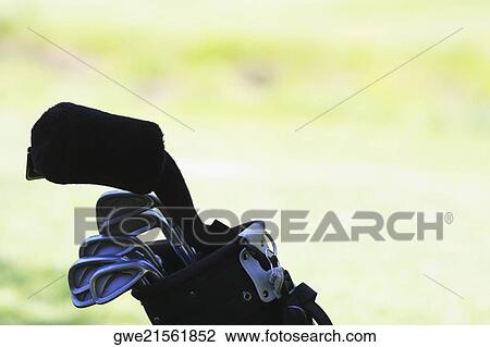 Stock Image - Close-up of golf clubs in a golf bag. Fotosearch