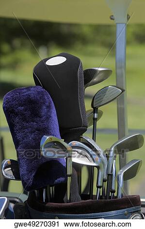Close-up of golf clubs in a golf bag View Large Photo Image Stock Image - Close-up of golf clubs in a golf bag. Fotosearch